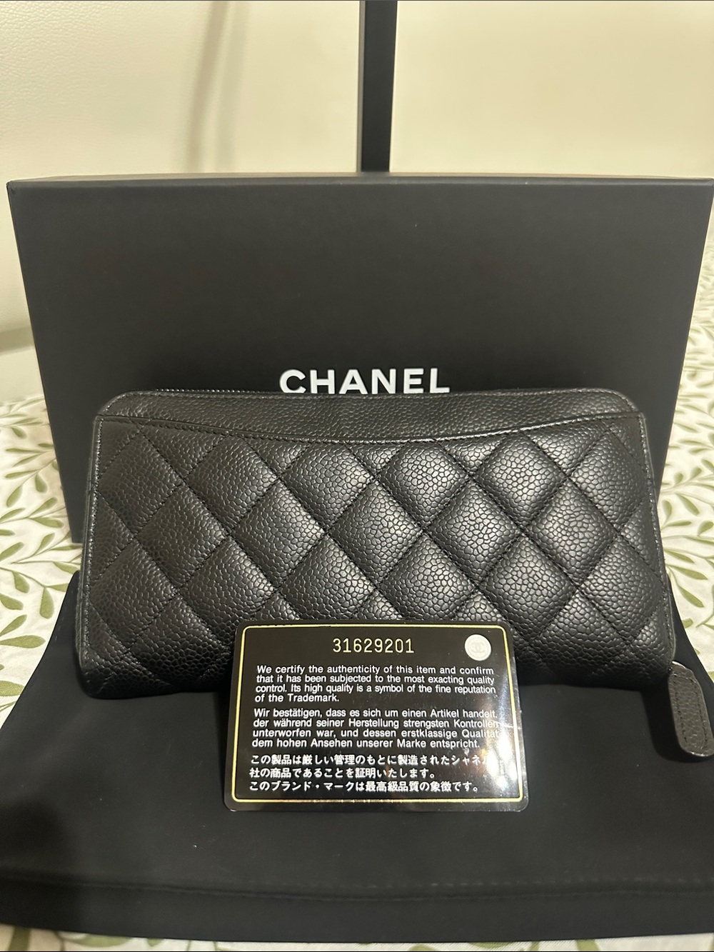 CHANEL Black Quilted Caviar Leather Zip-Around Wallet with CC Logo - Picture 2 of 15